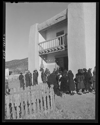 Trampas, New Mexico. Congregation leaving after mass from a church which was built in 1700 and is the best-preserved colonial mission in the Southwest