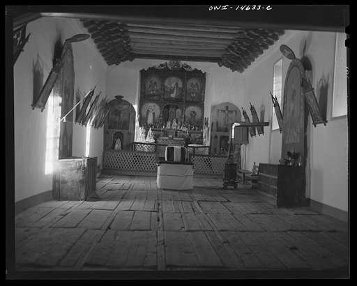 Trampas, New Mexico. A church which was built in 1700 and is the best-preserved colinal mission in the Southwest. Symbolic coffin placed in readiness for a memorial mass