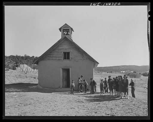 Ojo Sarco, New Mexico. One-room school in an isolated mountainous Spanish-American community, which has eight grades and two teachers. Afternoon recess