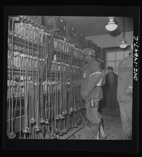 Pittsburgh (vicinity), Pennsylvania. Montour Number Four mine of the Pittsburgh Coal Company. Miners in the room where lamps are kept