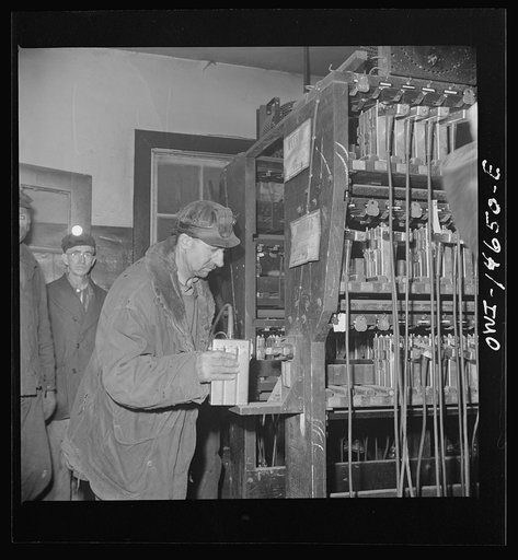 Pittsburgh (vicinity), Pennsylvania. Montour Number Four mine of the Pittsburgh Coal Company. Miners in the room where lamps are kept