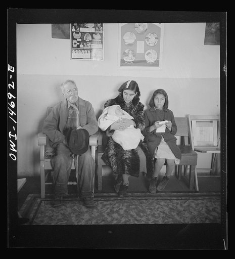 Penasco, New Mexico. Waiting room of the clinic operated by the Taos County cooperative health association on well baby day