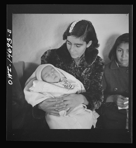 Penasco, New Mexico. Waiting room of the clinic operated by the Taos County cooperative health association on well baby day