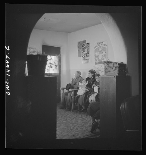 Untitled photo, possibly related to: Penasco, New Mexico. Waiting room of the clinic operated by the Taos County cooperative health association on well baby day