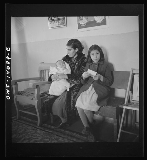 Penasco, New Mexico. Waiting room of the clinic operated by the Taos County cooperative health association on well baby day