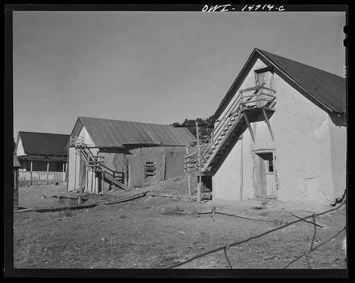 Ojo Sarco, New Mexico. Ojo Sarco valley is scattered with villages which have grown up around one family. The land is re-divided until its owners are forced to go elsewhere to make cash, while their families remain at home. Eastward rise the Truchas Mountains
