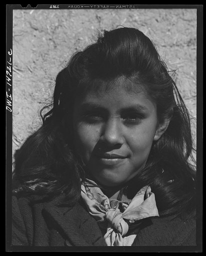 Ojo Sarco, New Mexico. One-room school in an isolated mountainous Spanish-American community, which has eight grades and two teachers. Girl during afternoon recess
