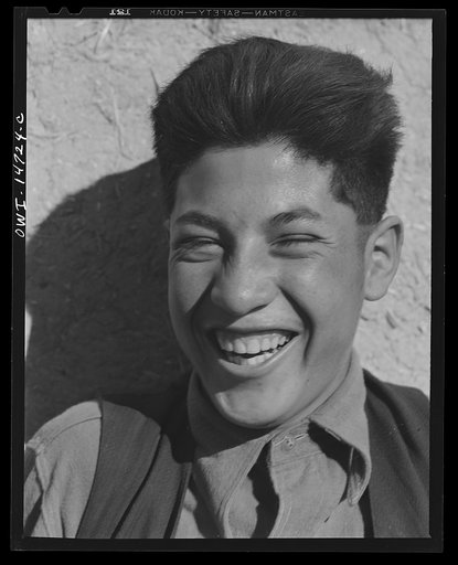 Ojo Sarco, New Mexico. One-room school in an isolated mountainous Spanish-American community, which has eight grades and two teachers. Boy during afternoon recess