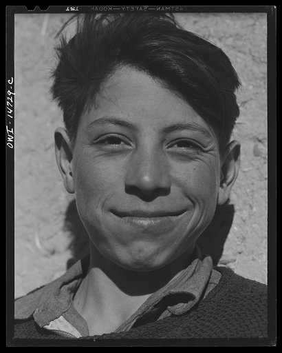 Ojo Sarco, New Mexico. One-room school in an isolated mountainous Spanish-American community, which has eight grades and two teachers. Boys during afternoon recess