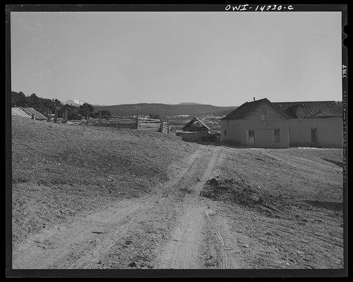 Ojo Sarco, New Mexico. Ojo Sarco Valley is scattered with villages which have grown up around one family. The land is re-divided until its owners are forced to go elsewhere to make cash, while their families remain at home. Eastward rise the Truchas Mountains