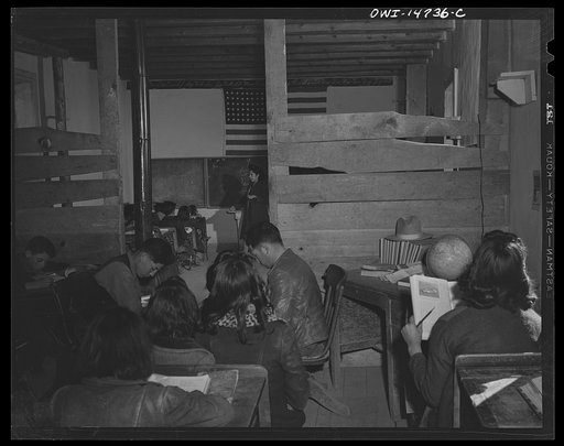 Ojo Sarco, New Mexico. One-room school in an isolated mountainous Spanish-American community, which has eight grades and two teachers. Most of the teaching is in Spanish, the language spoken in the children's homes, and as a result they rarely speak English fluently