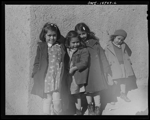 Untitled photo, possibly related to: Ojo Sarco, New Mexico. One-room school in an isolated mountainous Spanish-American community, which has eight grades and two teachers. Afternoon recess