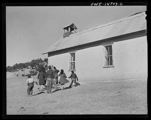 Ojo Sarco, New Mexico. One-room school in an isolated mountainous Spanish-American community, which has eight grades and two teachers. Afternoon recess