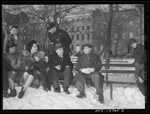 Untitled photo, possibly related to: New York, New York. An Italian-American cop chatting with a group of Italian-Americans in Washington Square Park