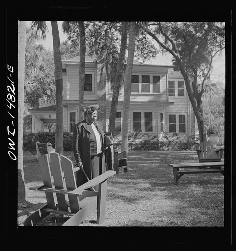 Daytona Beach, Florida. Bethune-Cookman College. Dr. Mary McLeod Bethune, founder and former president, walks to Sunday afternoon chapel