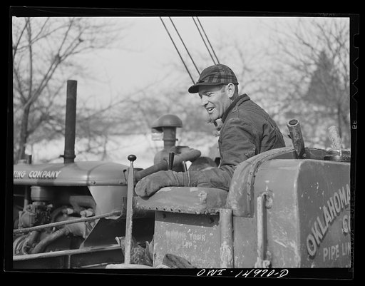Pennsylvania section of the war emergency twenty-four inch pipeline to carry oil from Texas fields to eastern refineries, completed in July 1943. Caterpillar tractor operator