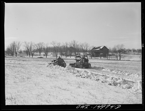 Pennsylvania section of the war emergency twenty-four inch pipeline to carry oil from Texas fields to eastern refineries, completed in July 1943. Right of way gang passing through the countryside