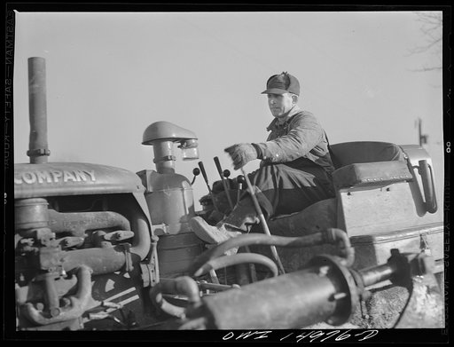 Pennsylvania section of the war emergency twenty-four inch  pipeline to carry oil from Texas fields to eastern refineries, completed in July 1943. Caterpillar tractor on the right of way gang