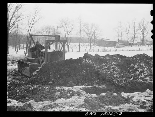 Pennsylvania section of the war emergency twenty-four inch pipeline to carry oil from Texas fields to eastern refineries, completed in July 1943. The right of way gang clearing land