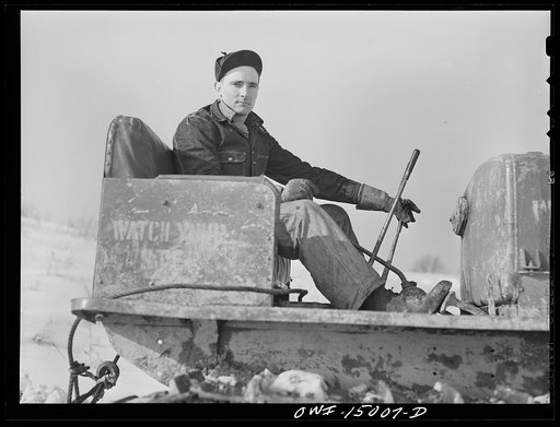 Pennsylvania section of the war emergency twenty-four inch pipeline to carry oil from Texas fields to eastern refineries, completed in July 1943. Caterpillar operator on the right of way gang