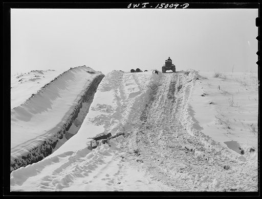 Pennsylvania section of the war emergency twenty-four inch pipeline to carry oil from Texas fields to eastern refineries, completed in July 1943. Pipeline going through hilly country