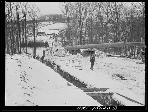 Pennsylvania section of the war emergency twenty-four inch pipeline to carry oil from Texas fields to eastern refineries, completed in July, 1943. Ditch going through the right of way