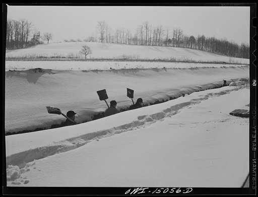 Pennsylvania section of the war emergency twenty-four inch pipeline to carry oil from Texas fields to eastern refineries, completed in July, 1943. Gang clearing rocks out of the ditch