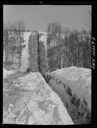 Pennsylvania section of the war emergency twenty-four inch pipeline to carry oil from Texas fields to eastern refineries, completed in July, 1943. Ditch for the pipeline in the hilly country