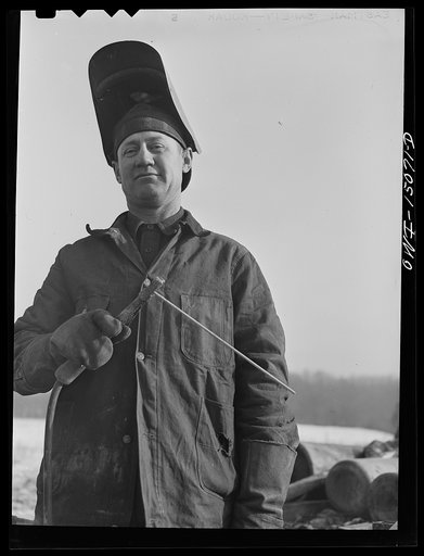Pennsylvania section of the war emergency twenty-four inch pipeline to carry oil from Texas fields to eastern refineries, completed in July 1943. Willis Garner, welder, originally from Texas. He has worked in Mexico, South America, Iraq