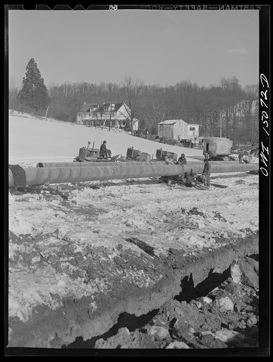Pennsylvania section of the war emergency twenty-four inch pipeline to carry oil from Texas fields to eastern refineries, completed in July 1943. Pipeline going through the Amish country of Lancaster County