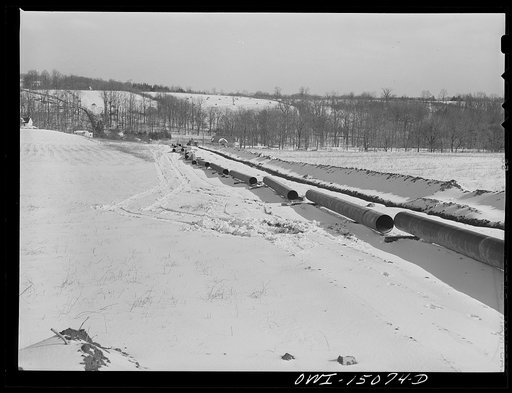 Pennsylvania section of the war emergency twenty-four inch pipeline to carry oil from Texas fields to eastern refineries, completed in July, 1943. Strung pipe and ditch