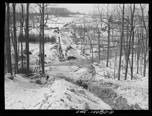 Pennsylvania section of the war emergency twenty-four inch pipeline to carry oil from Texas fields to eastern refineries, completed in July, 1943. Pipeline right of way through the countryside