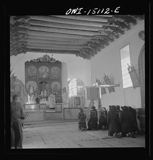 Trampas, New Mexico. Father Cassidy conducting mass at a church which was built in 1700 and is best-preserved colonial mission in the Southwest