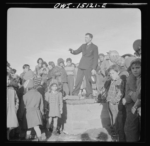 Panasco, New Mexico. Father Cassidy speaking at the dedication of the new building for the clinic operated by the Taos County cooperative health association