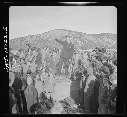 Penasco, New Mexico. Father Cassidy speaking at the dedication of the new building for the clinic operated by the Taos County cooperative health association