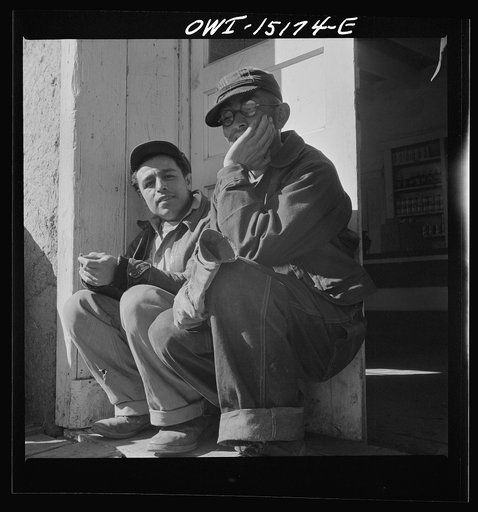 Untitled photo, possibly related to: Chacon, Mora County, New Mexico. Idlers at the general store