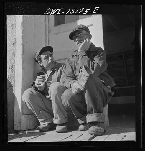 Chacon, Mora County, New Mexico. Idlers at the general store