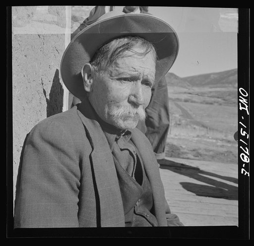 Untitled photo, possibly related to: Chacon, Mora County, New Mexico. Idlers at the general store