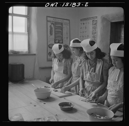 Untitled photo, possibly related to: Penasco, New Mexico. A domestic science class in the high school