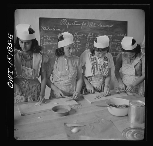 Untitled photo, possibly related to: Penasco, New Mexico. A domestic science class in the high school