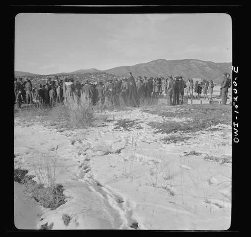 Untitled photo, possibly related to: Penasco, New Mexico. Father Cassidy speaking at the dedication of the new building for the clinic operated by the Taos County cooperative health association