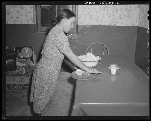 Untitled photo, possibly related to: Trampas, New Mexico. Nearly every meal at the home of Juan Lopez, the majordomo (mayor) [i.e., steward], starts with tortillas