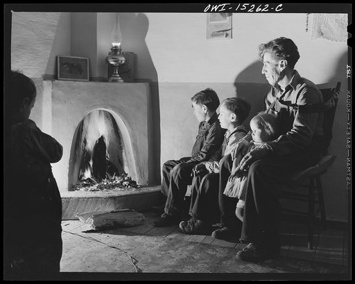 Trampas, New Mexico. The Lopez home is many generations old, and this fireplace has been the only form of heating its inhabitants have known