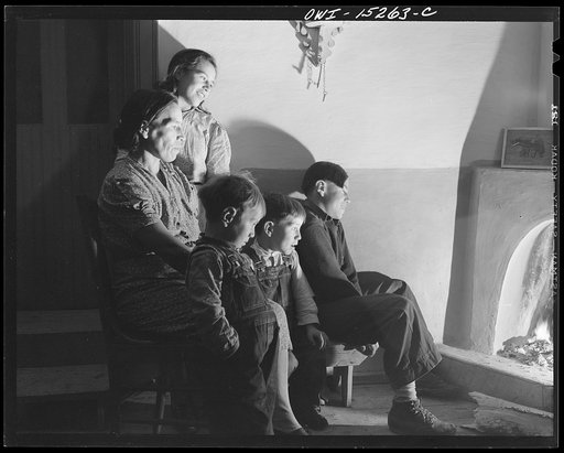 Trampas, New Mexico. The Lopez home is many generations old, and this fireplace has been the only form of heating its inhabitants have known