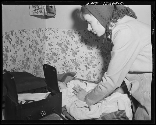 Llano Quemado (vicinity), New Mexico. Marjorie Muller, nurse from the clinic operated by the Taos County cooperative health association, making a home call