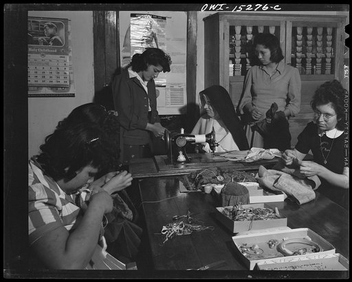 Penasco, New Mexico. A domestic science class in a high school which is supported by the state but administered by the Roman Catholic church