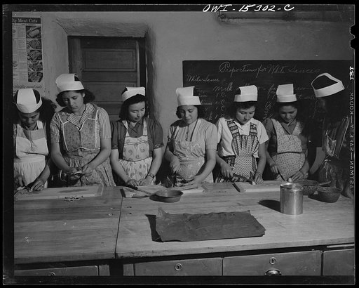Untitled photo, possibly related to: Penasco, New Mexico. Domestic science class in a high school supported by the state, but administered by the Catholic Church