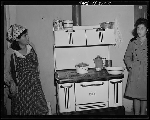 Untitled photo, possibly related to: Llano Quemado (vicinity), New Mexico. Marjorie Muller, nurse from the clinic operated by the Taos County cooperative health association, making a home call
