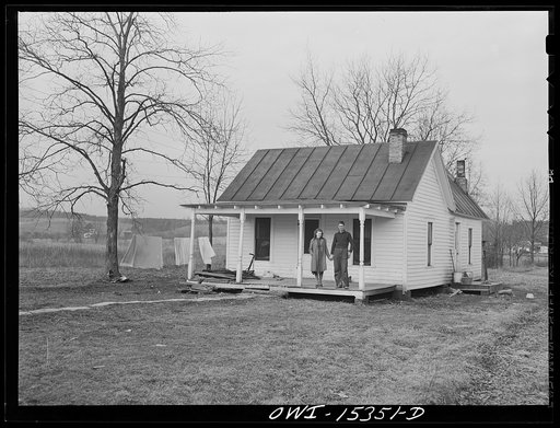 Gallia County, Ohio. Mr. and Mrs. Reed Hall at their new home on a 500 acre dairy farm. Mr. Hall was placed on this farm after attending the farm labor training school at Rio Grande College
