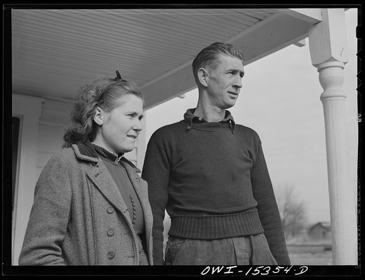 Rio Grande, Ohio. Reed Hall and his wife, Evelyn, on the porch of a new tenant home on 500 acre dairy farm in Gallia County, Ohio, where they were placed after Mr. Hall attended farm labor training school at Rio Grande College, Ohio